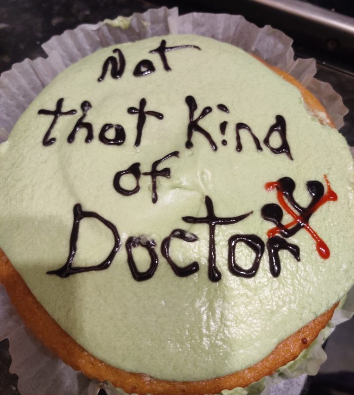 Not That Kind of Doctor written on a cake